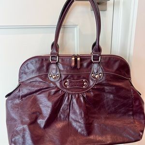 Used women’s leather Longchamp bag with handles